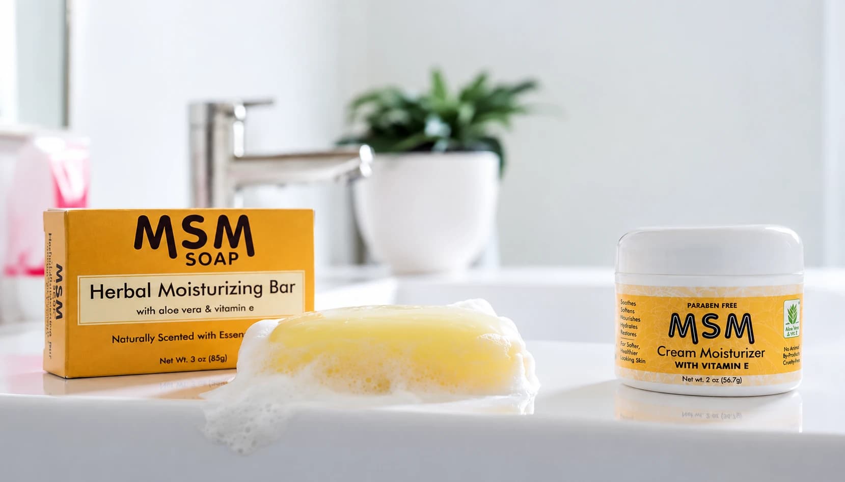 MSM Soap herbal bar, a lathered bar and the MSM Cream Moisturizer on a bathroom counter.